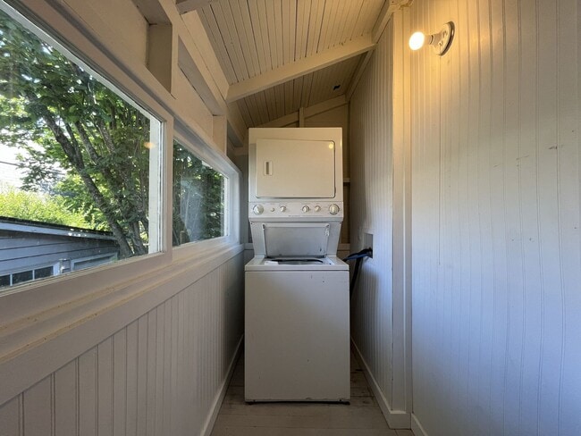 Building Photo - Charming Cottage with Hardwood Flooring, Modern Kitchen & Beautiful Outdoor Living Areas