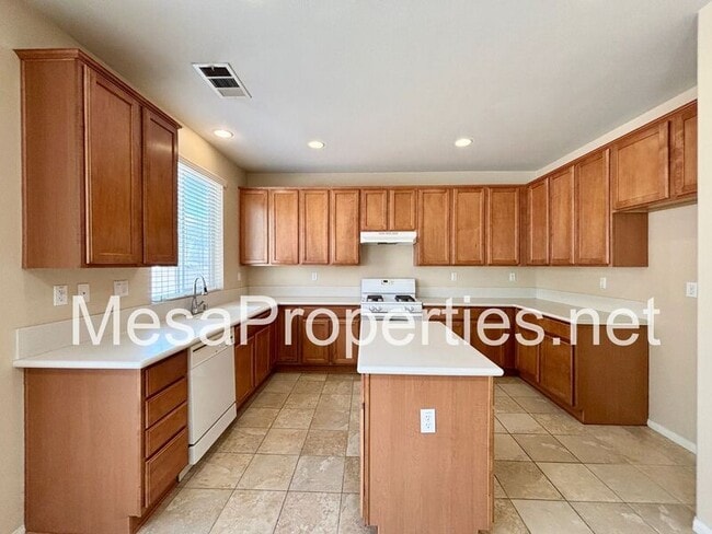 Building Photo - 16677 Desert Lily St