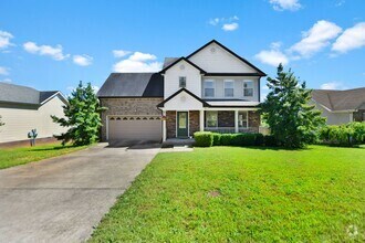 Building Photo - Pet Friendly Three Bedroom with Bonus!