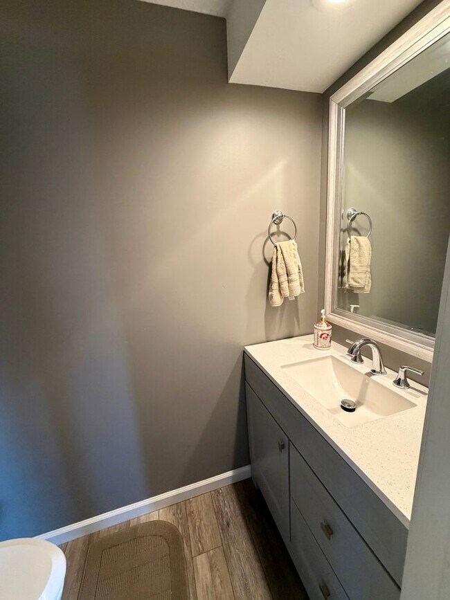 Building Photo - Modern Comforts Await: Spacious Rental with 2-Car Garage, Private Office, and Finished Basement w...