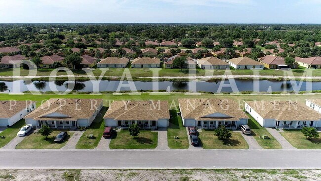 Building Photo - Your Season to Settle In – 3BR/2BA Duplex in Vistanna Villas, Lehigh Acres with Space, Style & St...