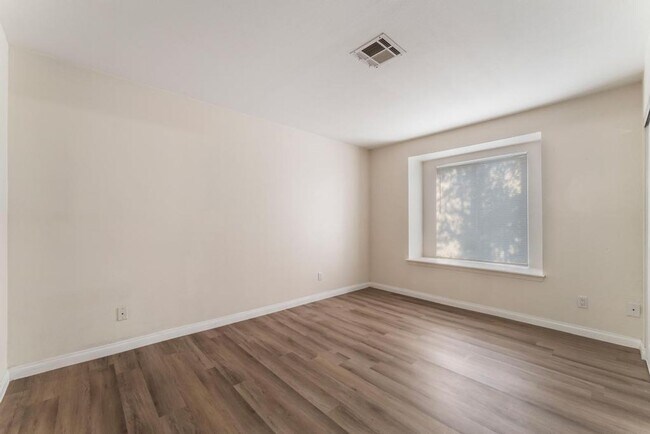 Building Photo - This beautifully renovated 2-bedroom, 2-bath condo is ready for immediate move-in!
