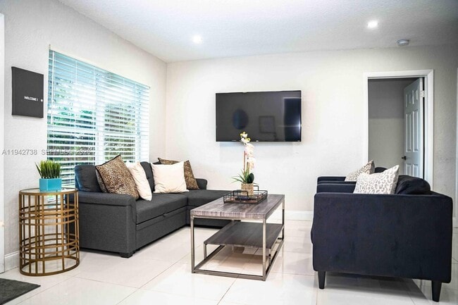 Building Photo - 5249 NE 3rd Ter.