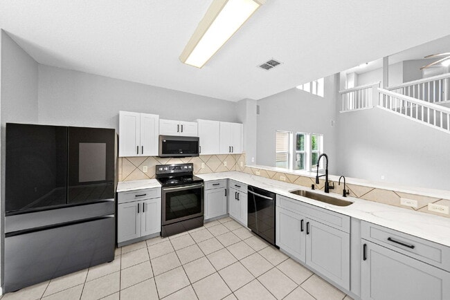 Building Photo - A Bright Open Home Built for Everyday Living and Easy Entertaining