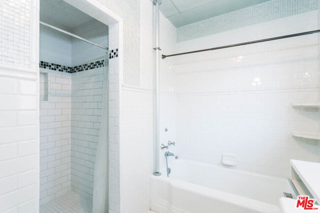 Building Photo - 10961 Strathmore Dr