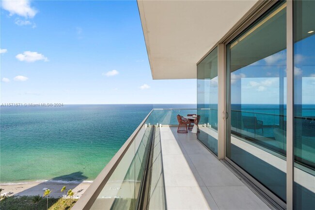 Building Photo - 10203 Collins Ave