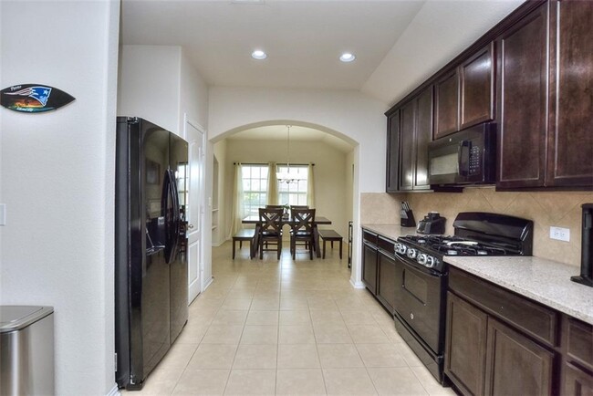 Building Photo - 8072 Bassano Dr