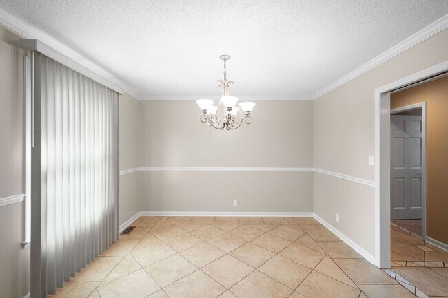 Building Photo - Move-In Special Available! Charming 3-Bedroom Home for Rent in Sango – Spacious Corner Lot