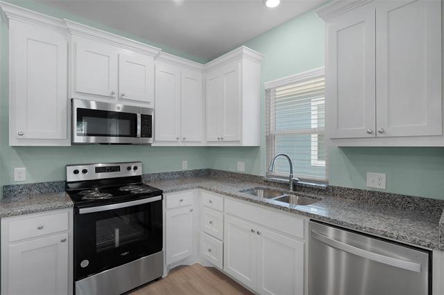 Building Photo - 2027 Bluebonnet Ave