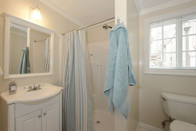 Building Photo - Welcome to this beautifully updated Spanis...