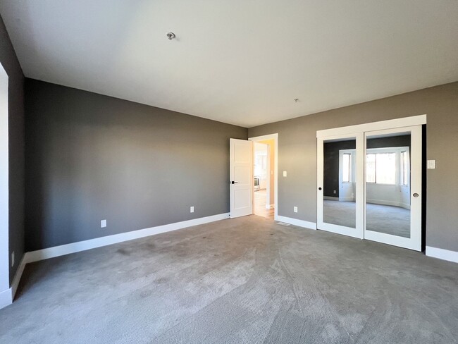 Building Photo - Beautifully Remodeled 2-Bedroom, 2-Bathroom Townhome with Single-Car Garage