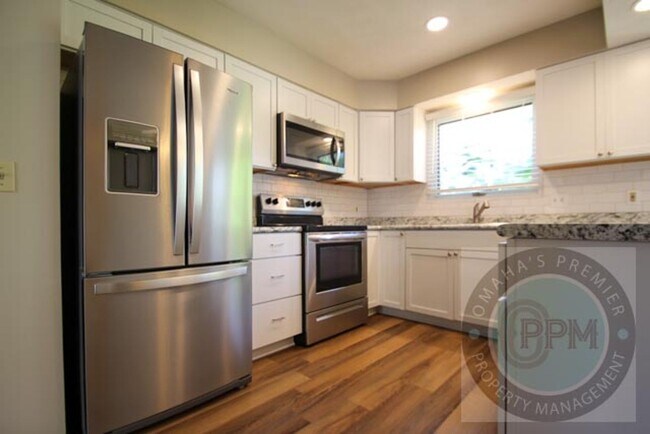 Building Photo - 6323 N 108th Ave Cir
