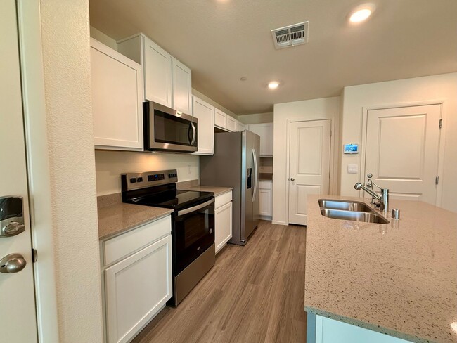 Building Photo - Brand-New Townhome for Rent in the Highly ...