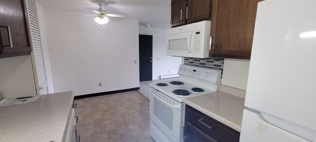 Building Photo - Upper 2 Bedroom Apartment – Heat Included - Available: First Week of June  2026