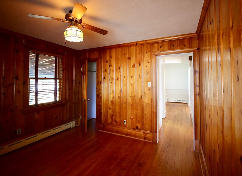 Smaller bedroom downstairs ideal for den or office, 10' x 11' - 2308 Buckingham Ave