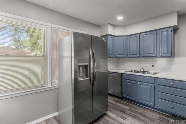 Building Photo - Cozy & Modern: 2-Bed Brick Home with Garage & Finished Basement