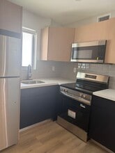Building Photo - 560 NE 63rd St