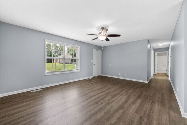 Building Photo - Pet Friendly Three Bedroom with Basement!
