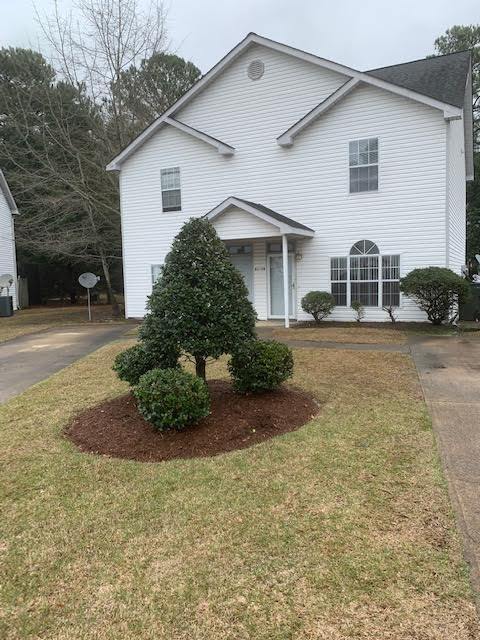 Building Photo - "Charming 2-Bedroom Duplex Retreat with 2.5 Baths in Greenville – Your 1116 Sq. Ft. Sanctuary Awa...