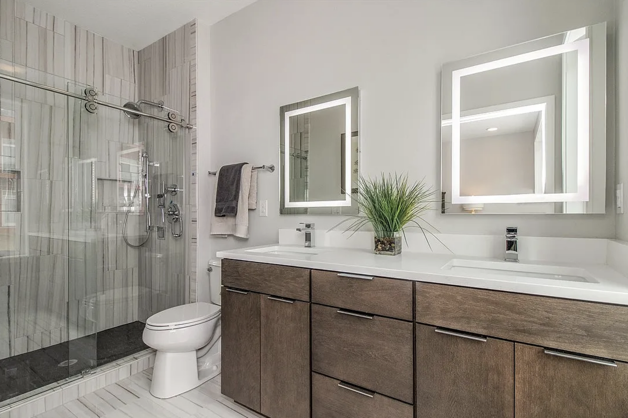 The master bathroom with 3-way shower. - 216 E Center St