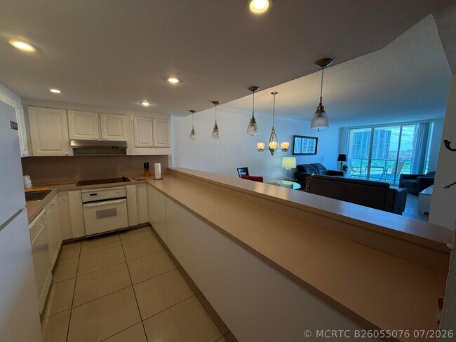 Building Photo - 19390 Collins Ave