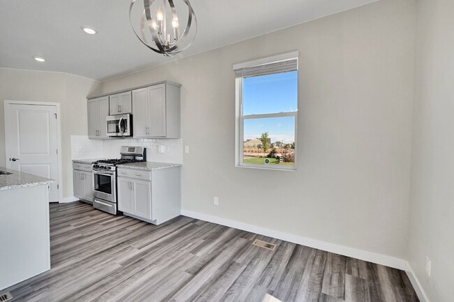 Building Photo - $3,190.95 - 5 Bed, 3 Bath Home in Thornton with Cozy Fireplace and Fenced-in Yard