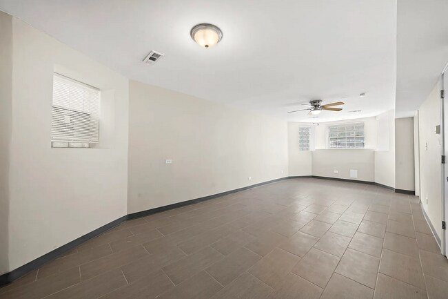 Building Photo - Spacious 2BR, 2BA Haven with Hardwood Elegance right across from Humboldt Park!