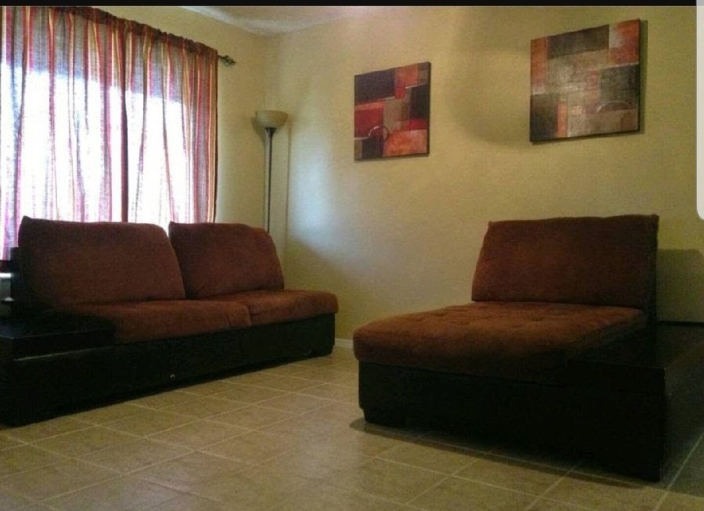 Large living room with ceramic tile - 6111 Pierce St