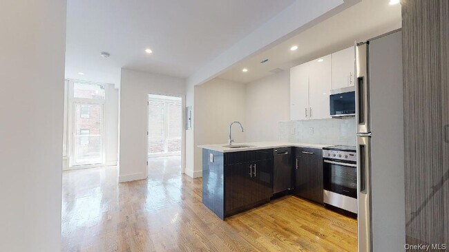 Building Photo - 138-28 Queens Blvd