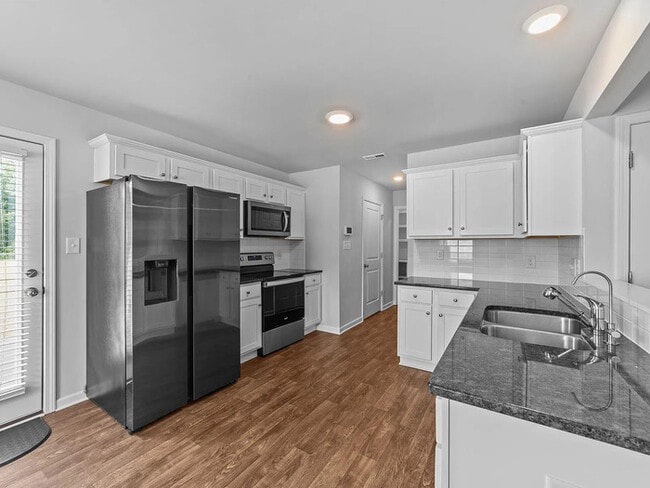 Building Photo - Earn Wealth While Leasing - Like a Homeown...
