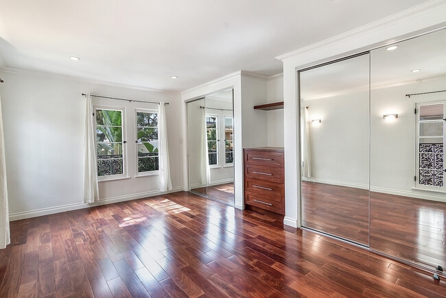 Primary bedroom closets with built in drawers - 8459 W 4th St