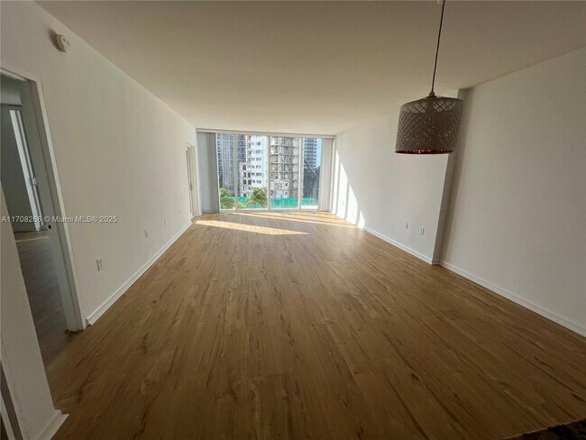 Building Photo - 10275 Collins Ave
