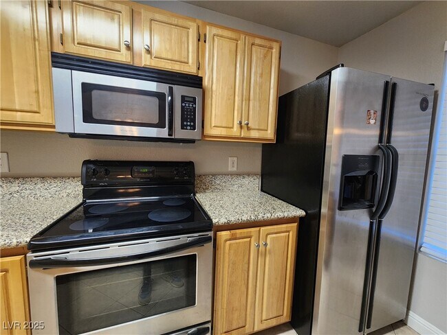 Building Photo - 5055 W Hacienda Ave
