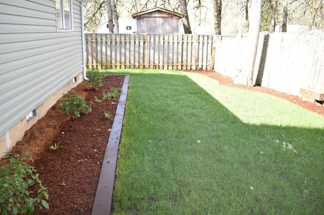 Building Photo - Modern home tucked away in the adorable little town of Brownsville.