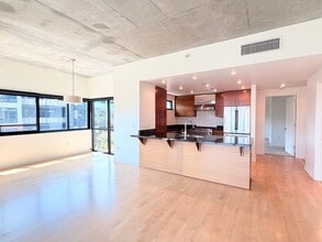 Building Photo - Spacious Luxury Riverfront Condo Near NW 23rd! Parking, Storage, Most Utilities Included!