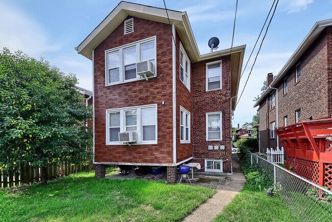 Building Photo - 4955 Tholozan Ave