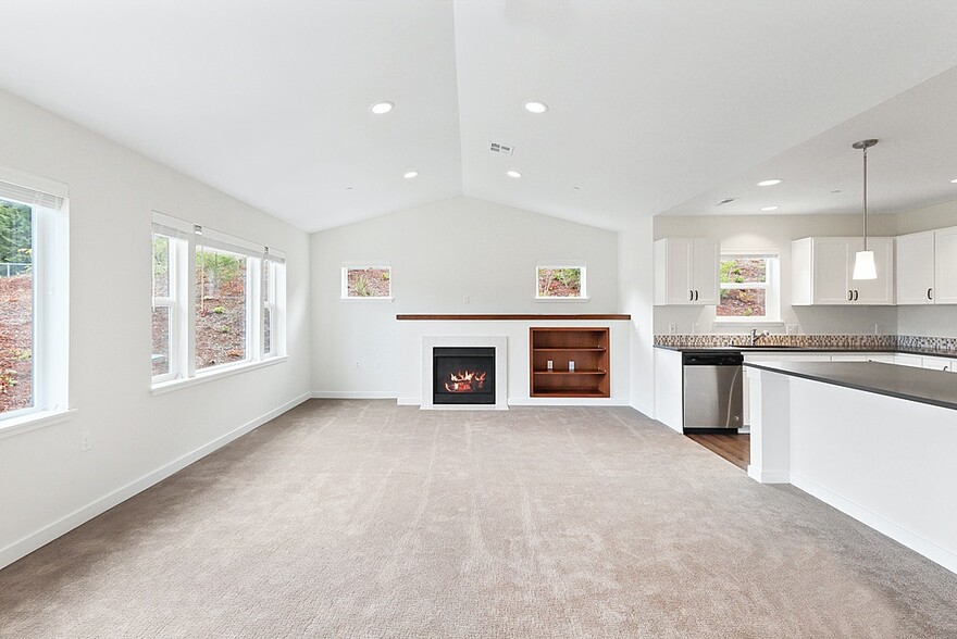 Spacious living room with gas fireplace - Cottages on the Ridge - 55+