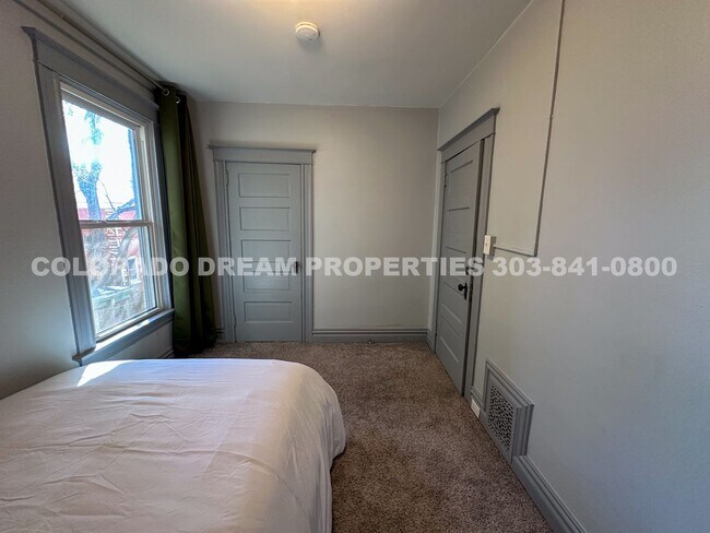 Building Photo - A home where old-world charm meets modern sophistication!