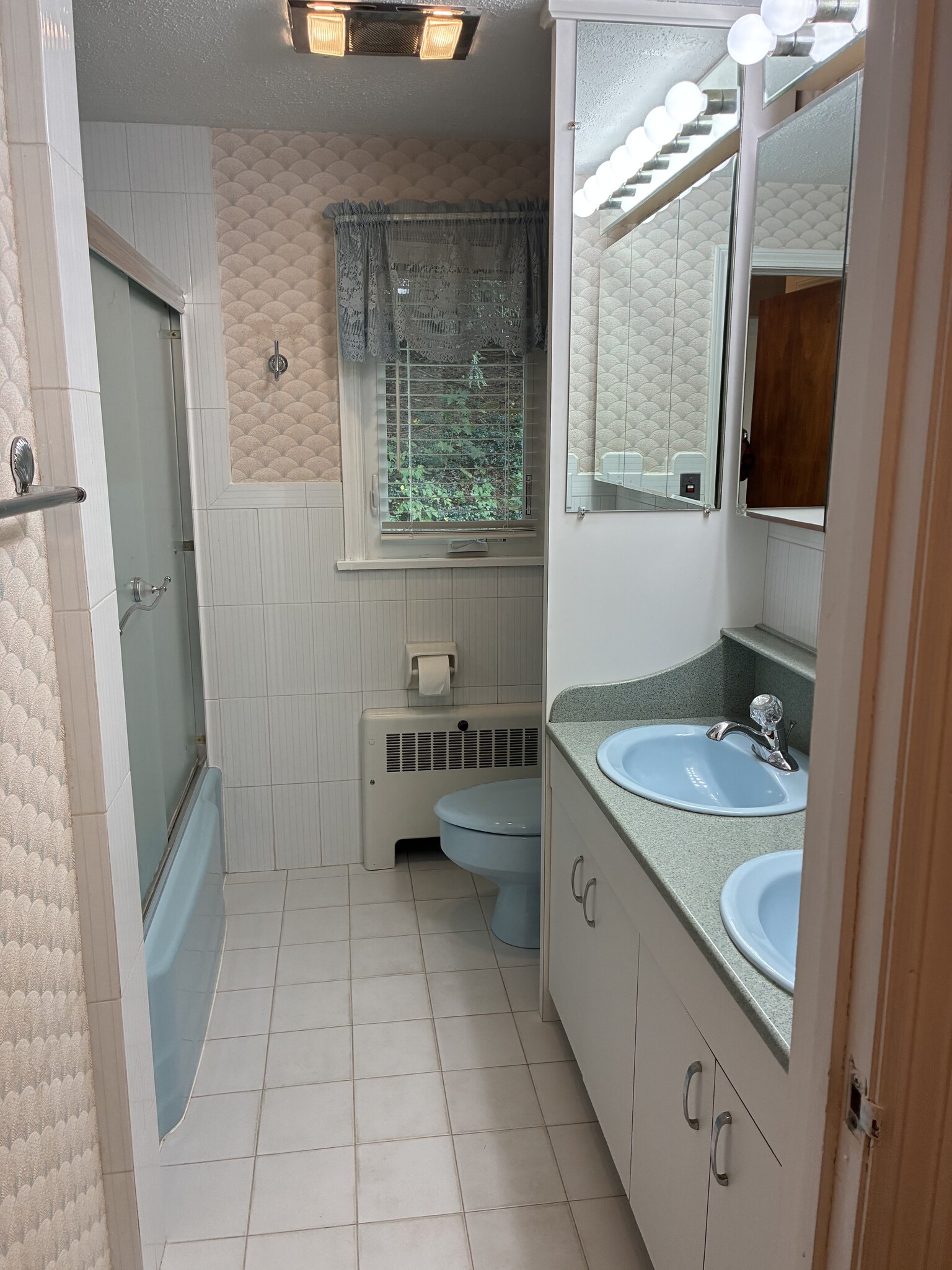 Bathroom with double vanities and coriander countertop - 197 Carter Ln