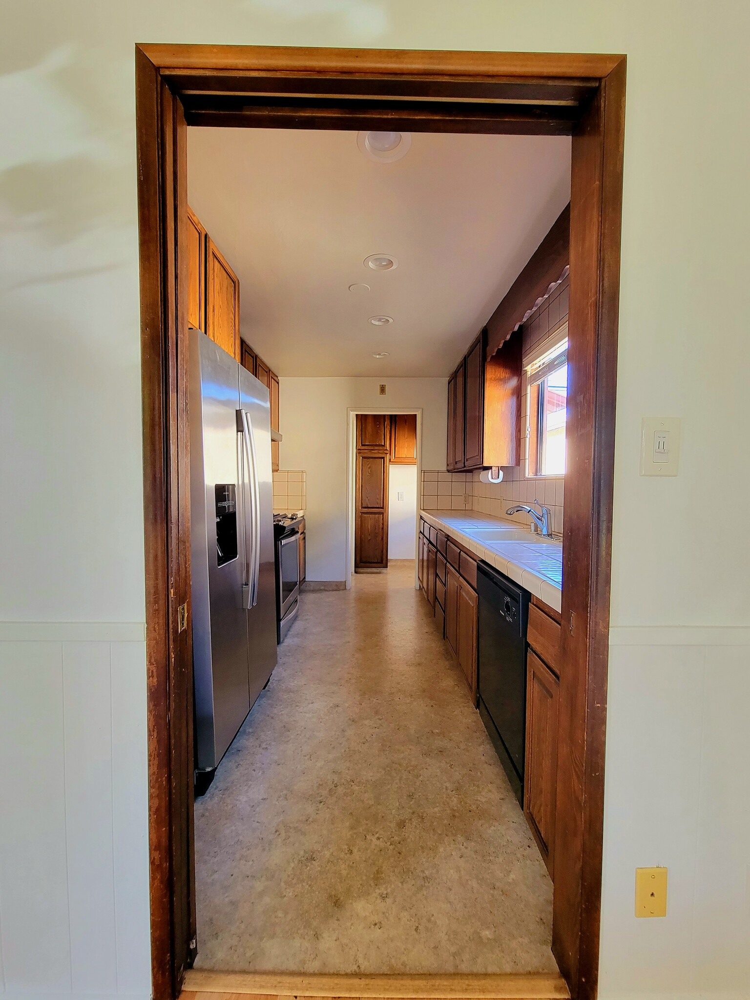 View from DINING room to enter kitchen - 12051 Alberta Dr