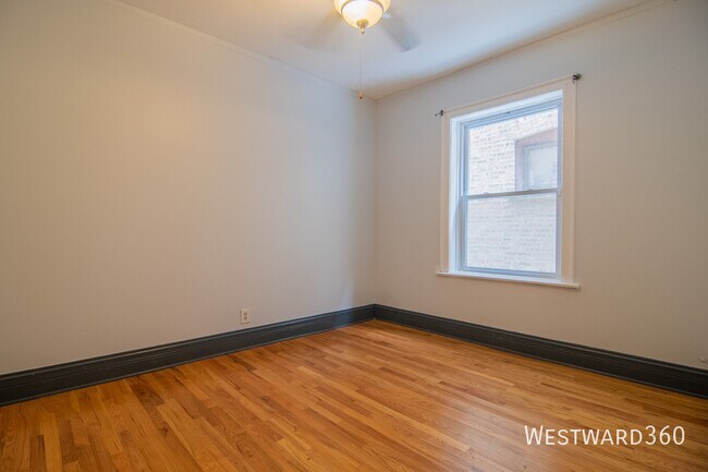Building Photo - 7640 S Phillips-1