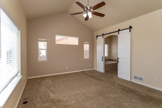 Building Photo - Spacious 5-Bedroom Home with Finished Base...