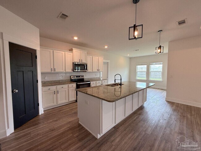 Building Photo - 6169 Jenks Dr