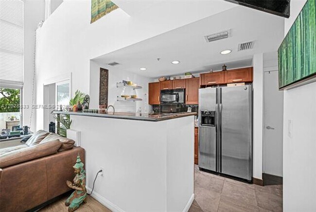 Building Photo - 7728 Collins Ave