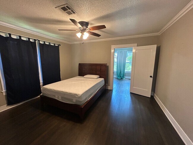 Building Photo - Spacious Corner Lot Charm