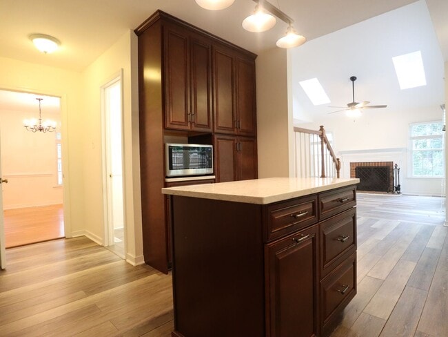 Building Photo - Spacious 4-Bedroom with Fenced Yard, Deck,...