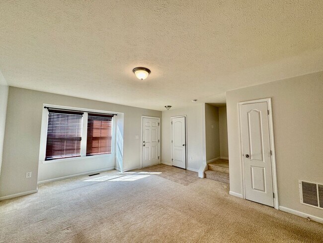 Building Photo - 3 Bed/ 2.5 Bath Townhome close to the interstate - Available 06/08/2026