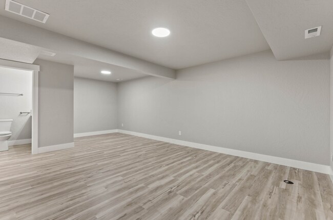 Building Photo - Newly Built 4 Bedroom Duplex With Yard