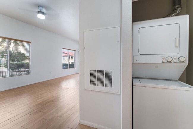 Building Photo - Charming Ground-Floor Condo with Wood Flooring & Modern Comforts!