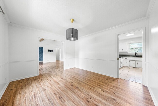 Building Photo - Pet Friendly Three Bedroom with Basement!